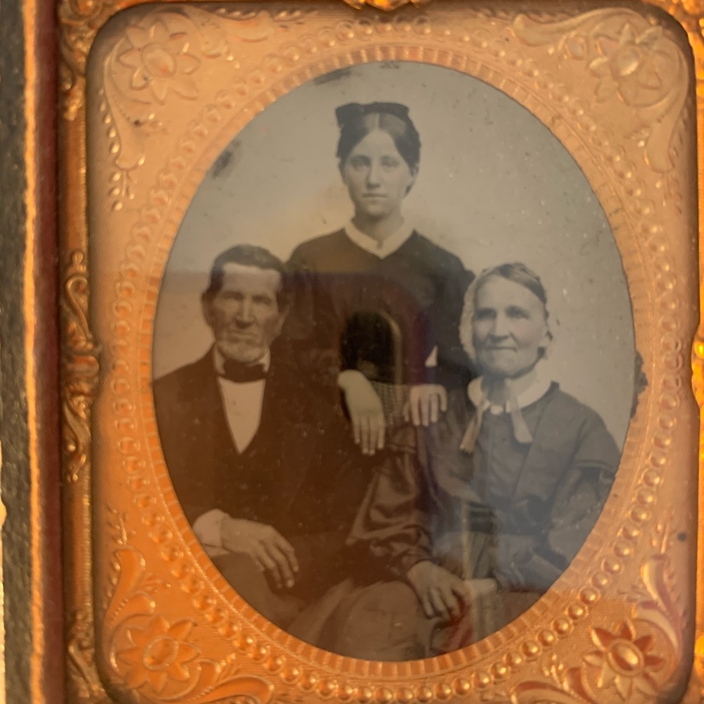 Antique daguerreotype photo of family